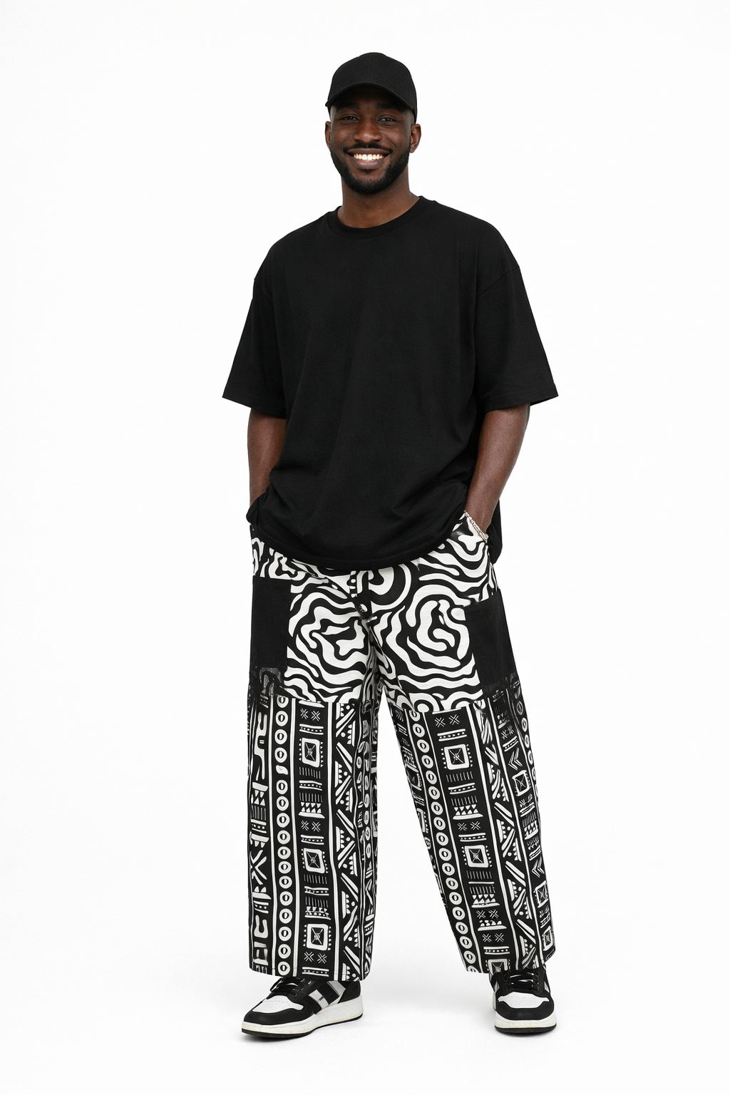 Crafted with precision and style. Bold for the modern man. 

Made from premium breathable cotton, the pant gives a relaxed, straight leg fit clean finishing and comfort-focused tailoring. Whether paired with a black T-shirt or white tee, this look transitions seamlessly from casual outings to special occasions 